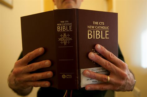 Bible in hands